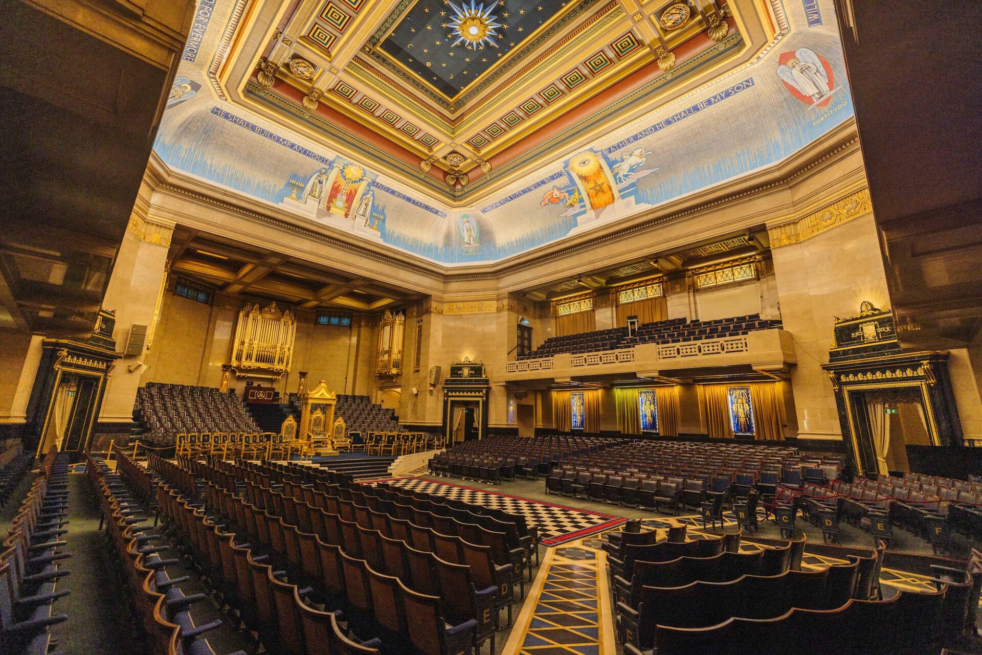 The Grand Temple inside Freemasons' Hall, London, with its painted ceiling of stars and gilded mosaics